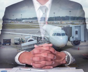 Plane imposed over man in suit