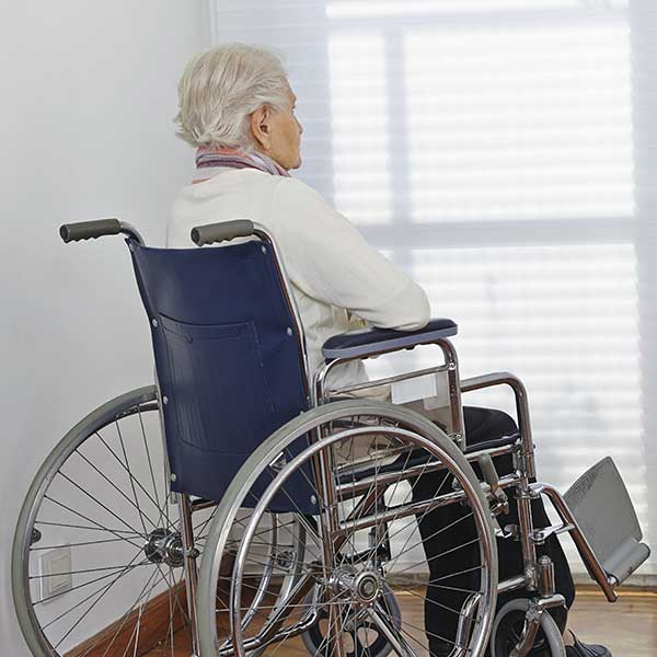 Elderly man in a wheelchair