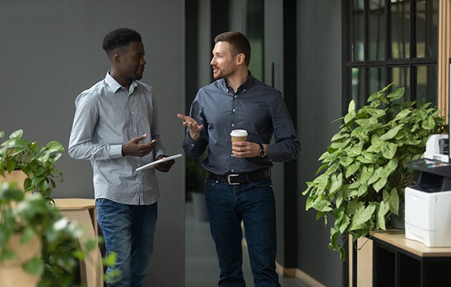 Coworkers having a discussion