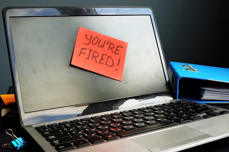 computer laptop with you're fired message
