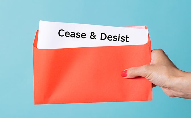 Cease-and-desist letter in hand