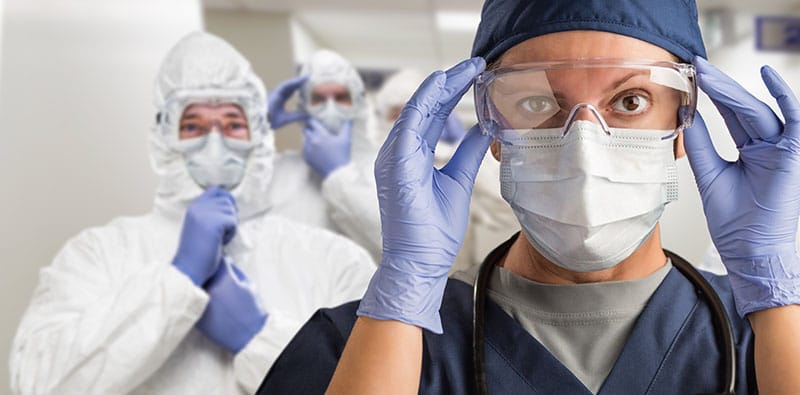 Team of doctors wearing Personal Protective Equipment (PPE)