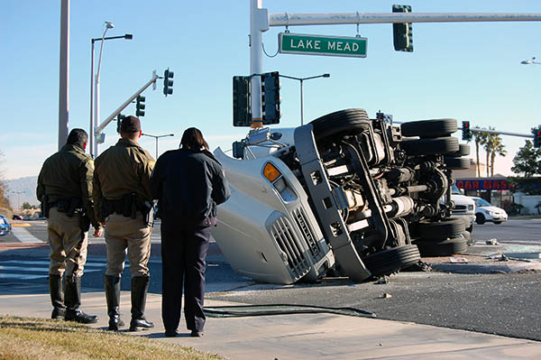 Overturned truck along highway