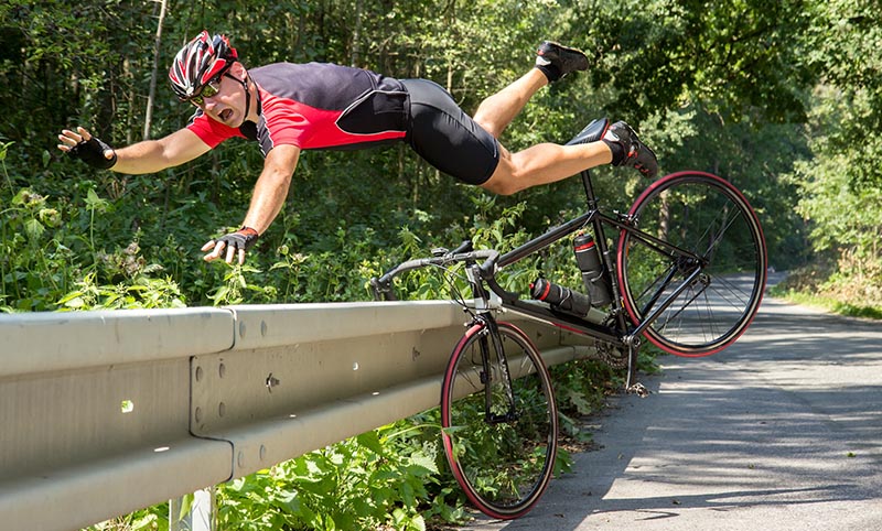 Bicyclist flying over rail after bike crash