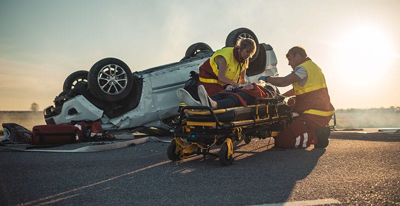 Catastrophic injury victim being treated by emergency services
