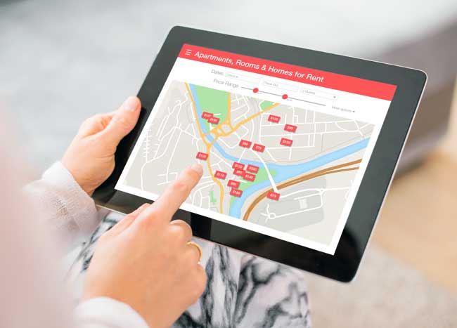 airbnb homes for rent map on tablet