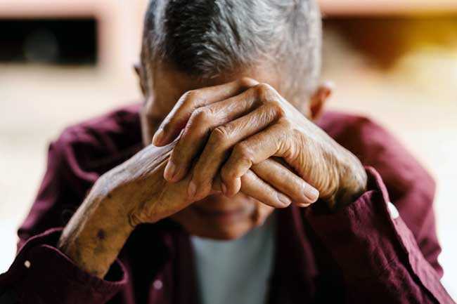 person with elder abuse frustrated
