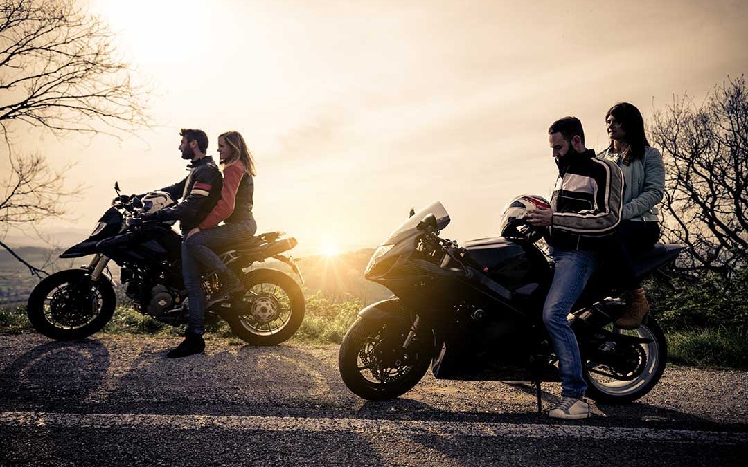 Motorcycle Riders and Passengers on Motor Bikes