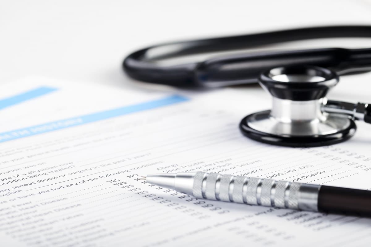 Medical health form and stethoscope