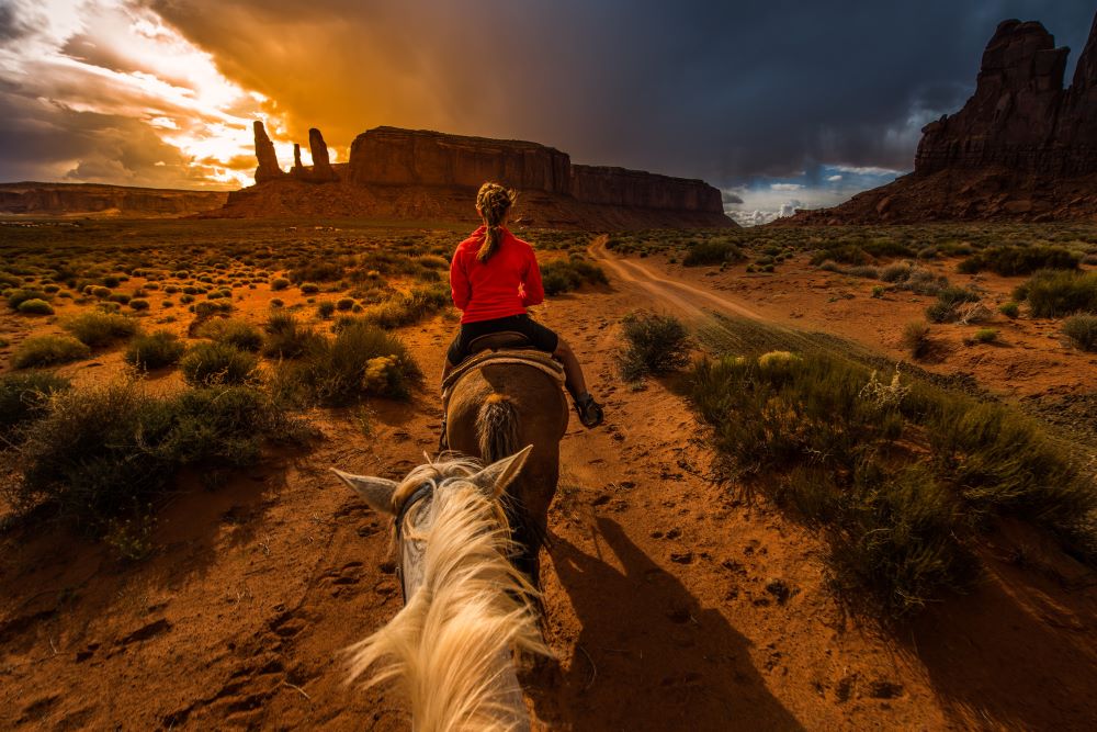 Desert horseback ride at sunset