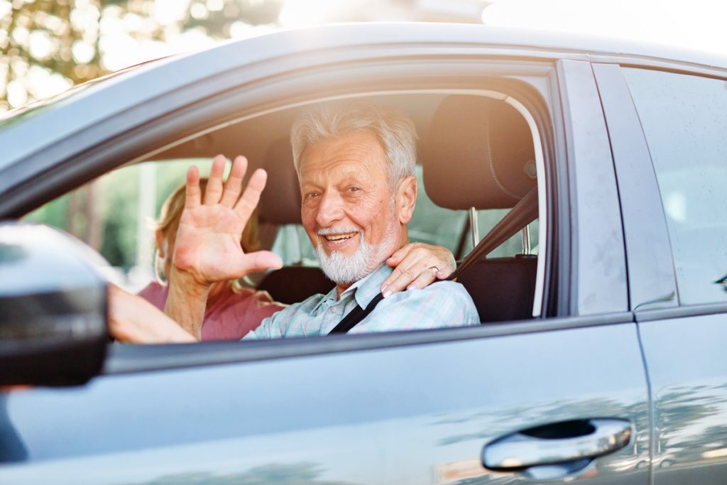 Seniors Driving a Car