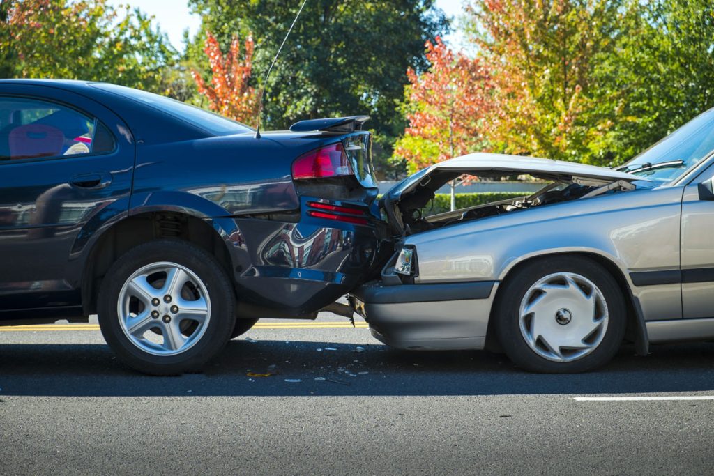 two cars crash rear-end each other