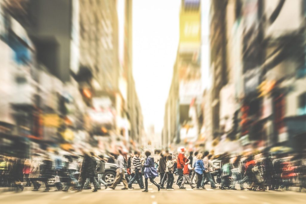 Pedestrians walking across crosswalk