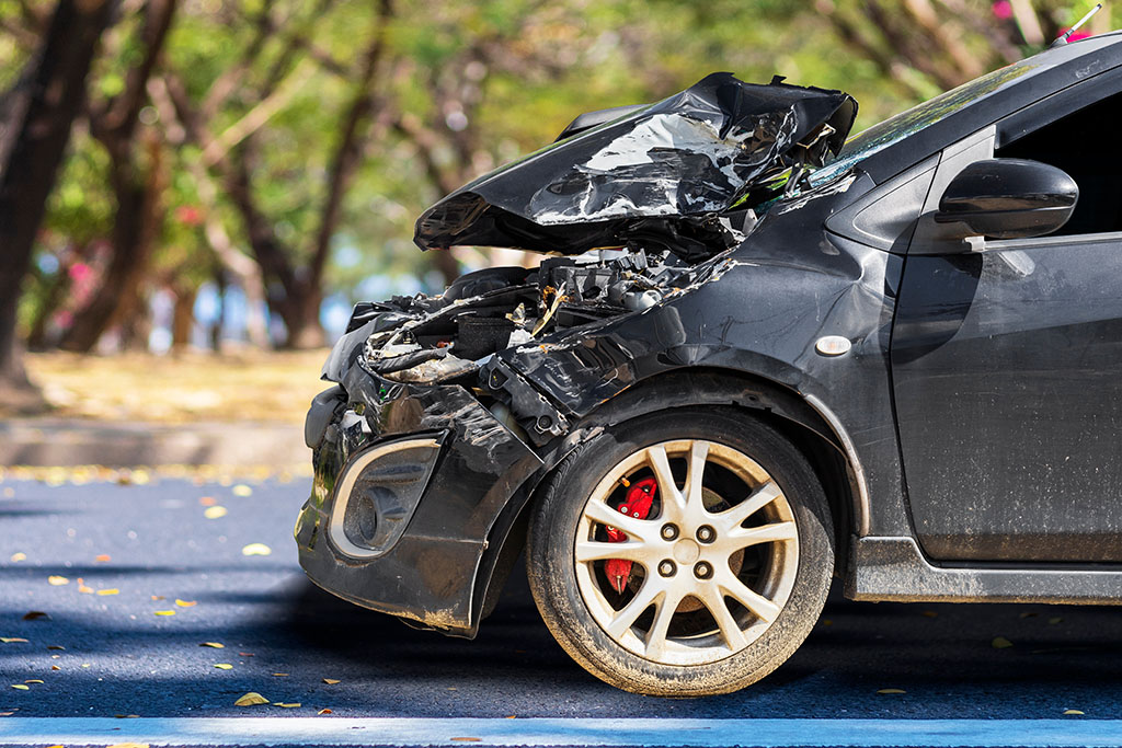 Front of car smashed in hit and run accident