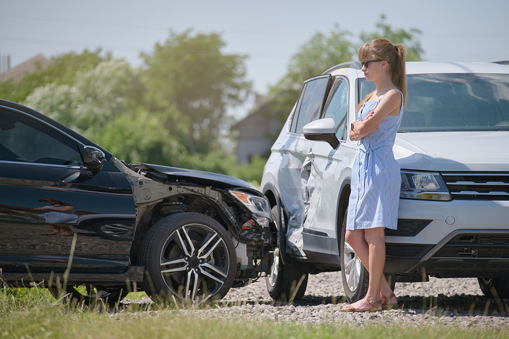 Woman angry after car accident caused significant damage to her vehicle