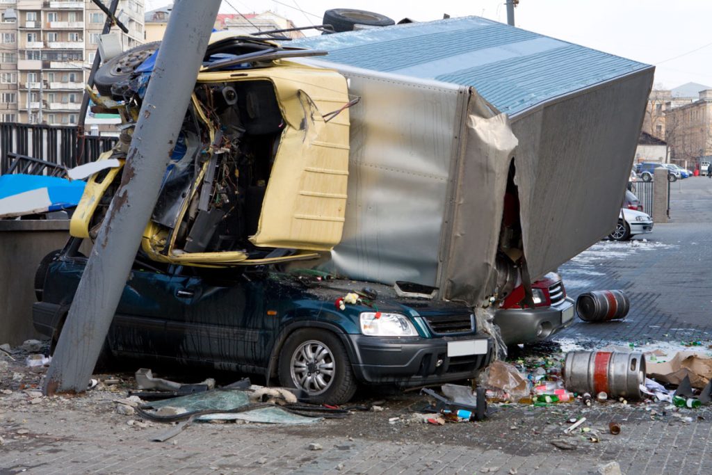 truck accident turnover on car